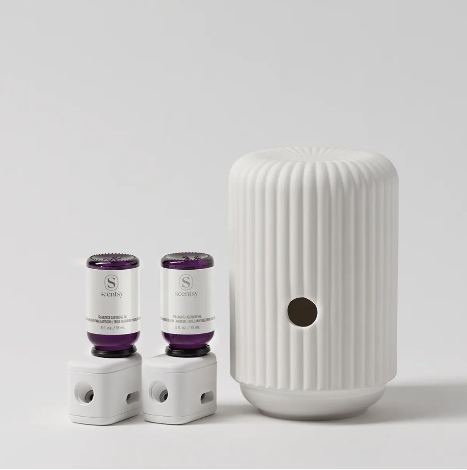 Scentsy Solo smart diffuser paired with two fragrance cartridges — the July 2026 bundle